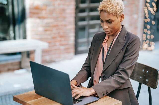 Grant writer working at her laptop